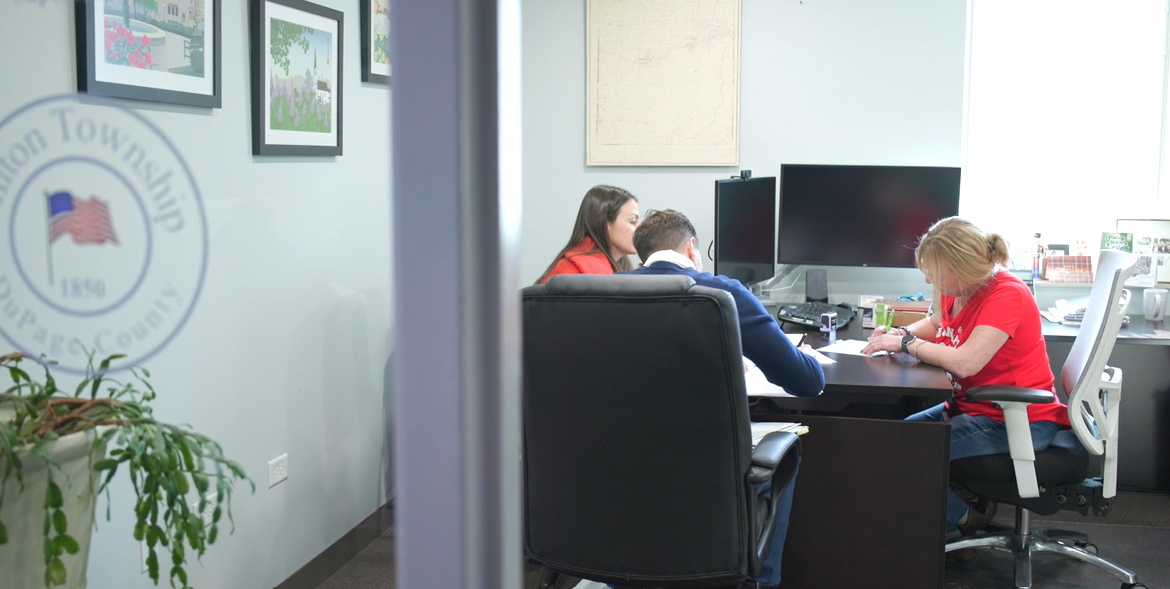 Notary appointment at desk in Township office